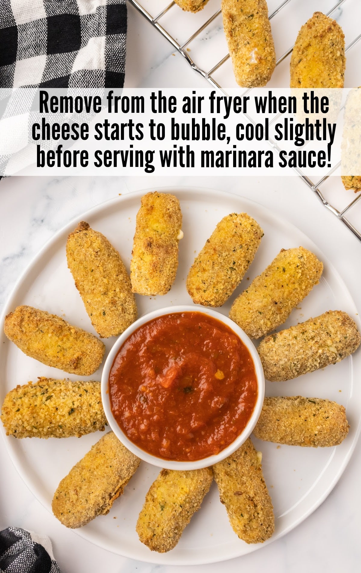 mozzarella removed from Air Fryer and served with Marinara sauce