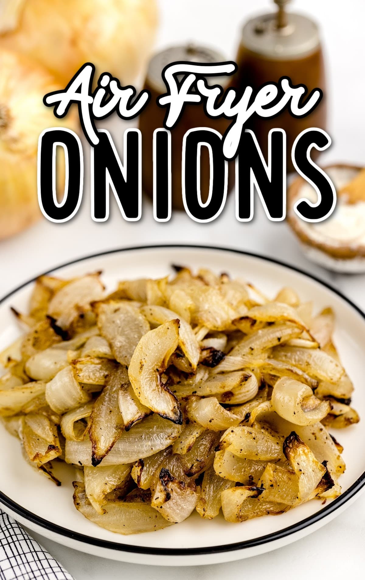 a close up shot of Air Fryer Onions on a plate