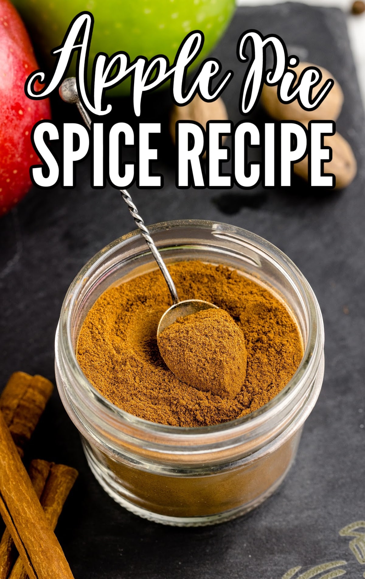 close up shot of a jar of Apple Pie Spice with a spoon