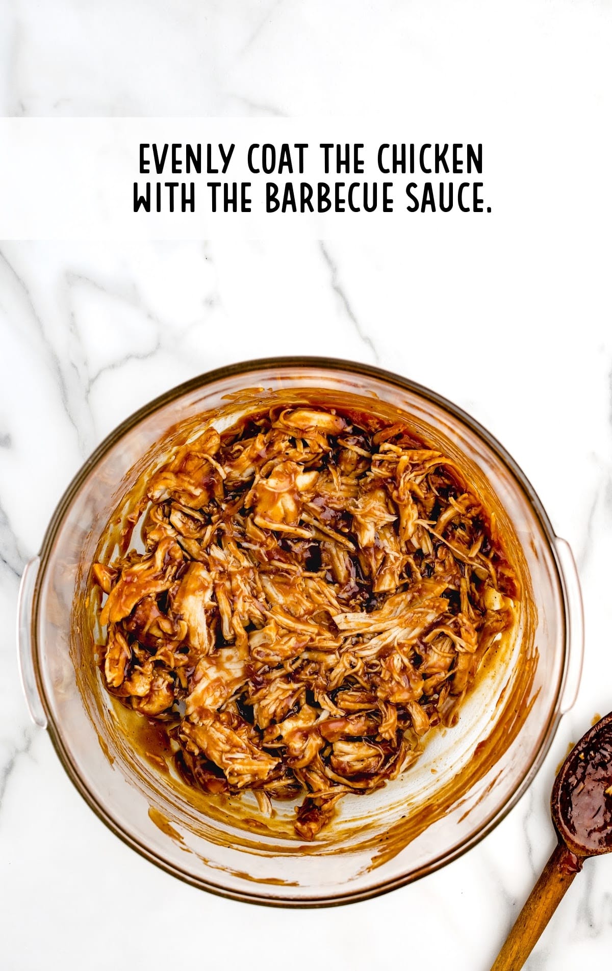 cooked chicken coated with barbecue sauce in a pot