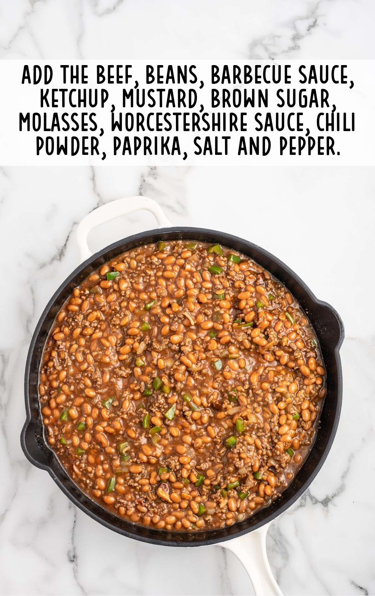 baked beans, bottled barbecue sauce, ketchup, yellow mustard, brown sugar, molasses, Worcestershire sauce, chili powder, smoked paprika, salt, and black pepper added to the skillet