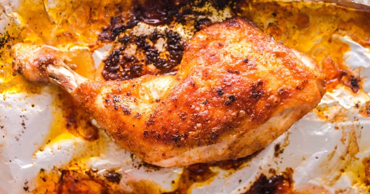 overhead shot of Baked Chicken Legs on aluminum foil