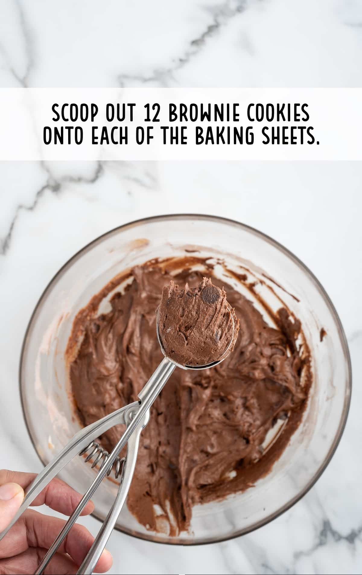 chocolate chip mixture scooped out and placed in a baking sheet