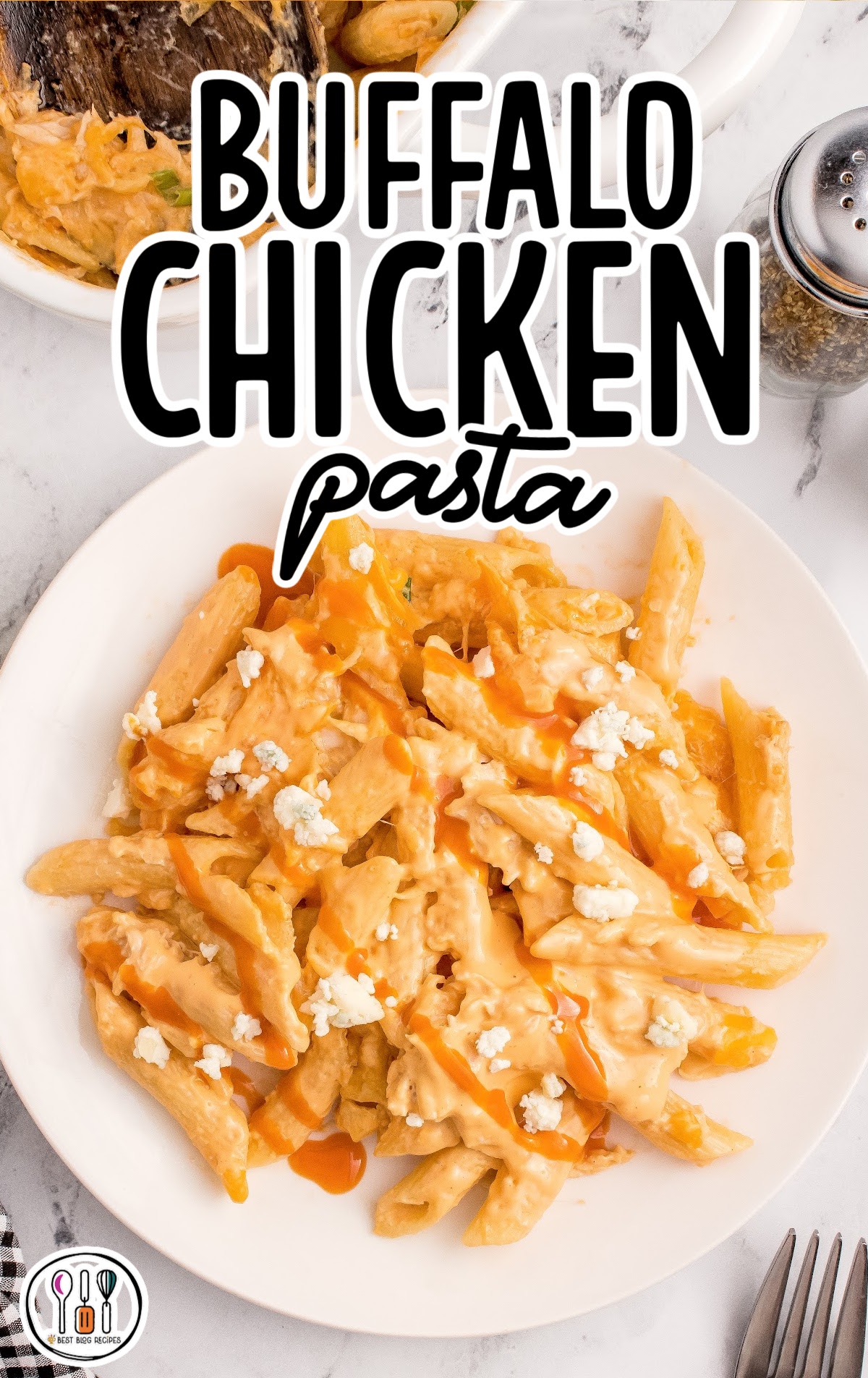 overhead shot of a plate of Buffalo Chicken Pasta topped with blue cheese