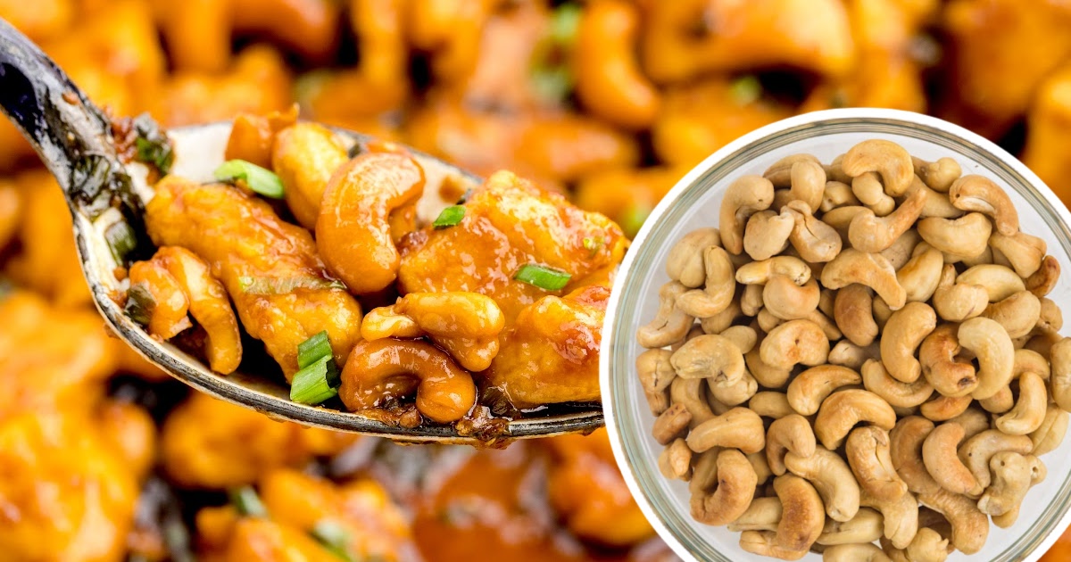 close up shot of a skillet full of Tuscan Chicken with a spoonful of sauce