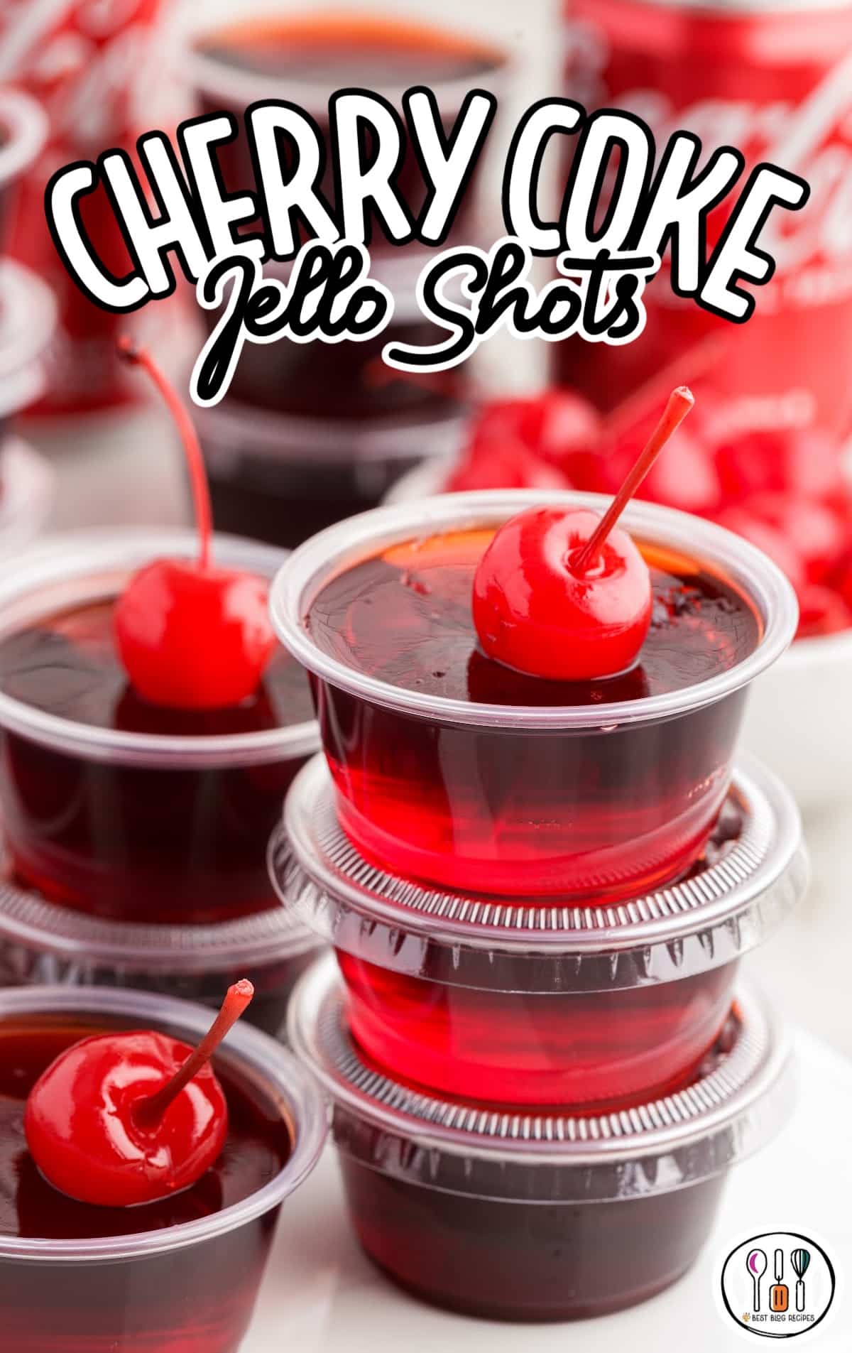 a close up shot of Cherry Coke Jello Shots stacked on top of each other