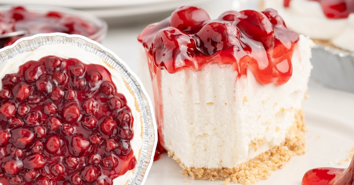 slice of cherry cream cheese pie on a plate with cherry pie filling spilling over the side