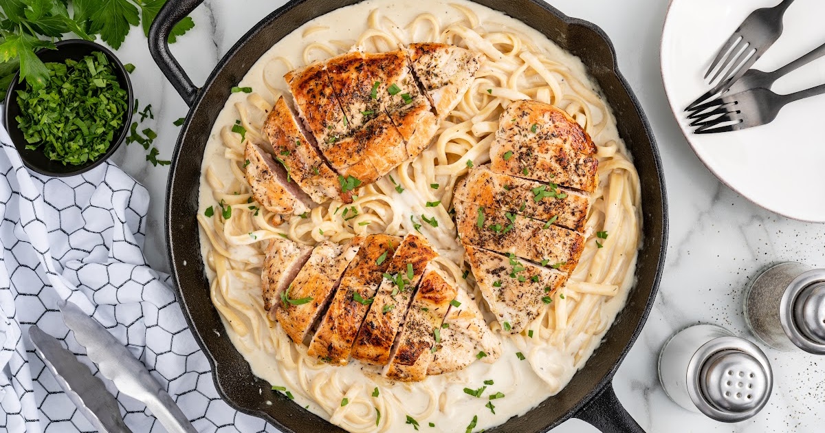 chicken sliced and placed on top of the pasta