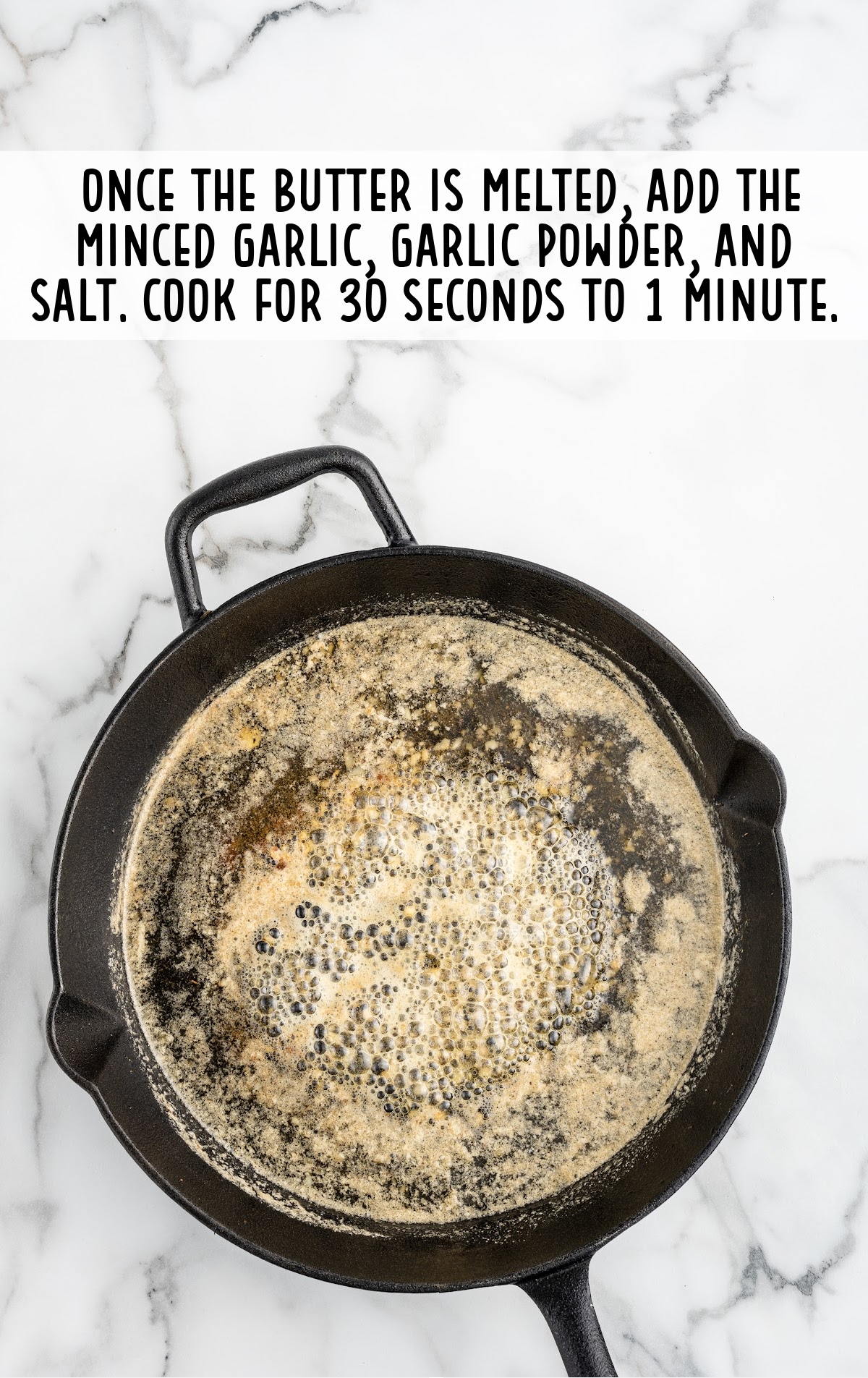 minced garlic, garlic powder and salt added to the butter
