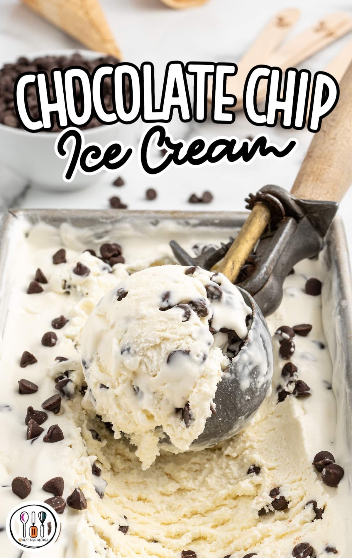 ice cream topped with chocolate chips being scooped out of the pan