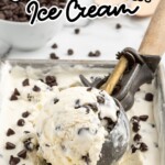 ice cream topped with chocolate chips being scooped out of the pan