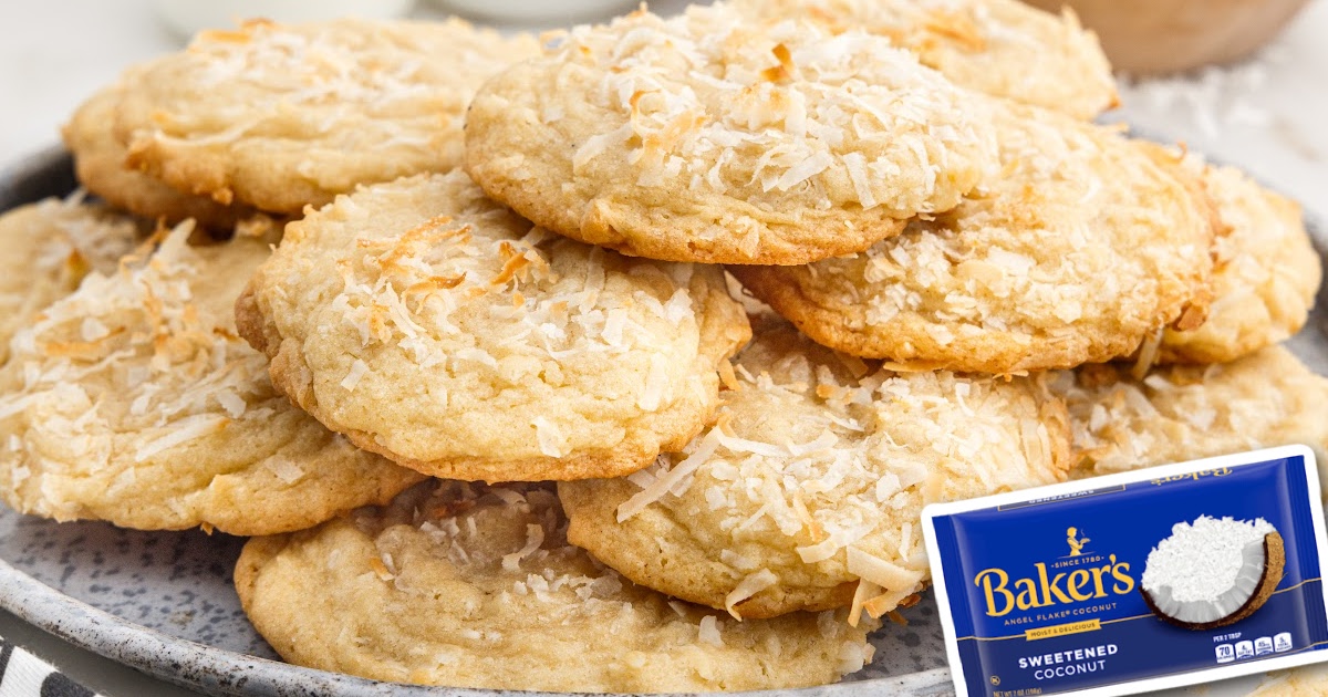 a close up shot of Coconut Cookies on top of each other on a platter