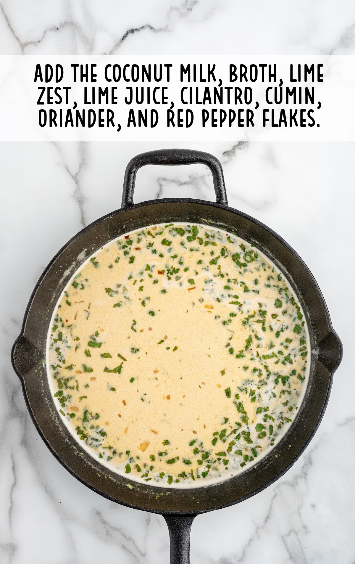 unsweetened coconut milk, chicken broth, lime zest, fresh lime juice, fresh cilantro, ground cumin, ground coriander, and red pepper flakes combined in a skillet