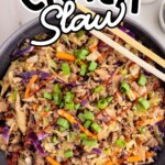 overhead shot of Crack Slaw in a skillet with a wooden spoon