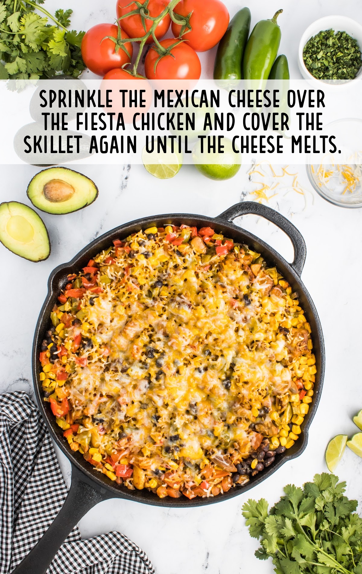 Mexican cheese sprinkled over the fiesta chicken