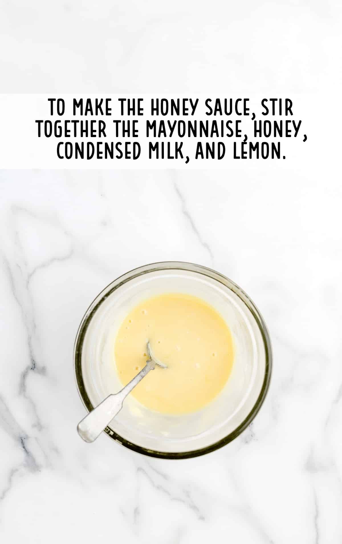 mayonnaise, honey, sweetened condensed milk, and lemon juice combined in a bowl
