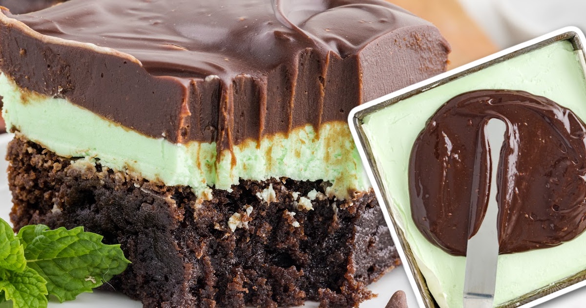 close up shot of a slice of Mint Chocolate Brownies with a mint leaf on a plate