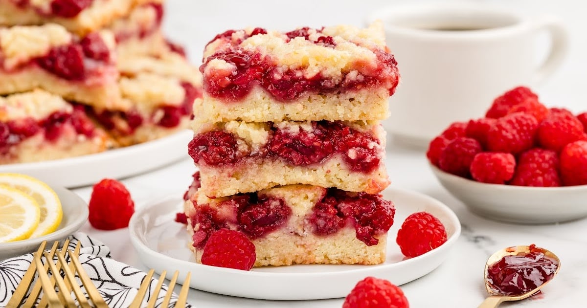 Raspberry Squares piled on a plate