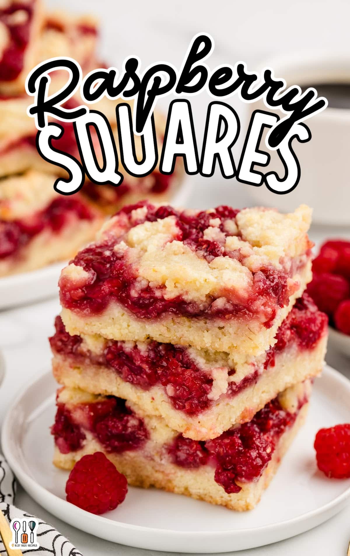 Raspberry Squares stacked on a plate