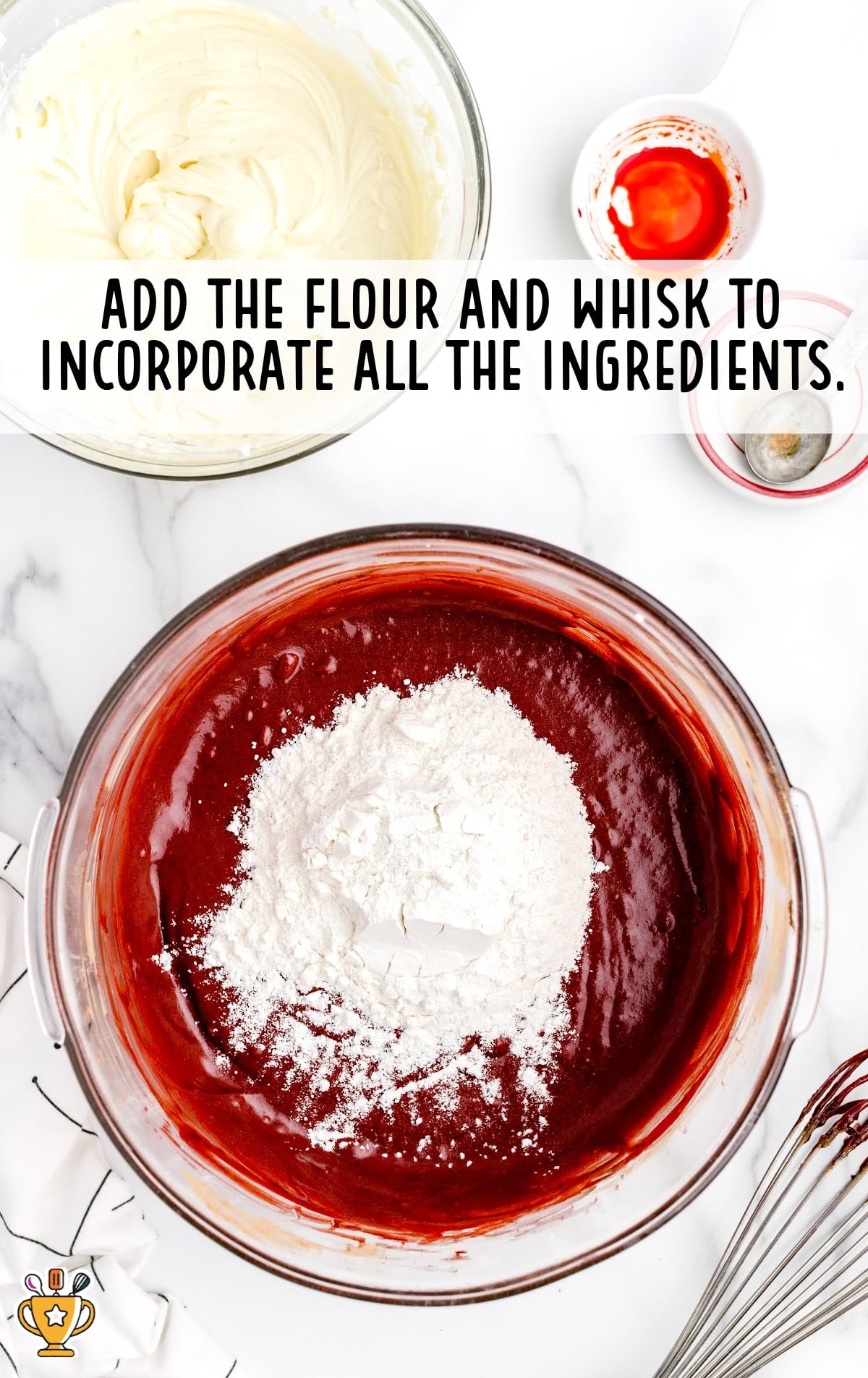 flour added incorporated with all the ingredients and whisked in a bowl