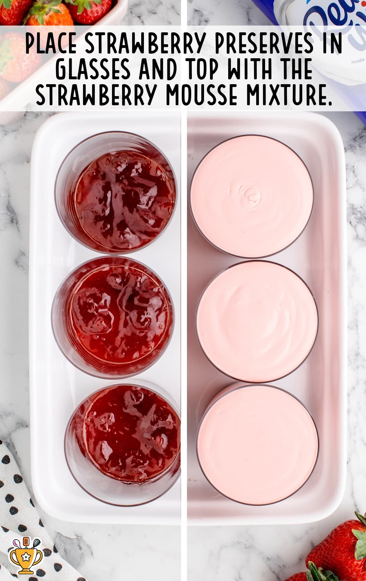 strawberry preserves placed in a glass and topped with the strawberry mousse mixture