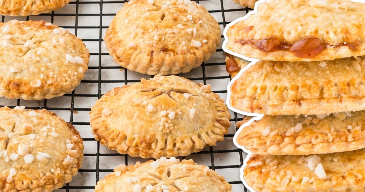 close up shot of a bunch of Air Fryer Apple Pies with a bite taken out of one of them
