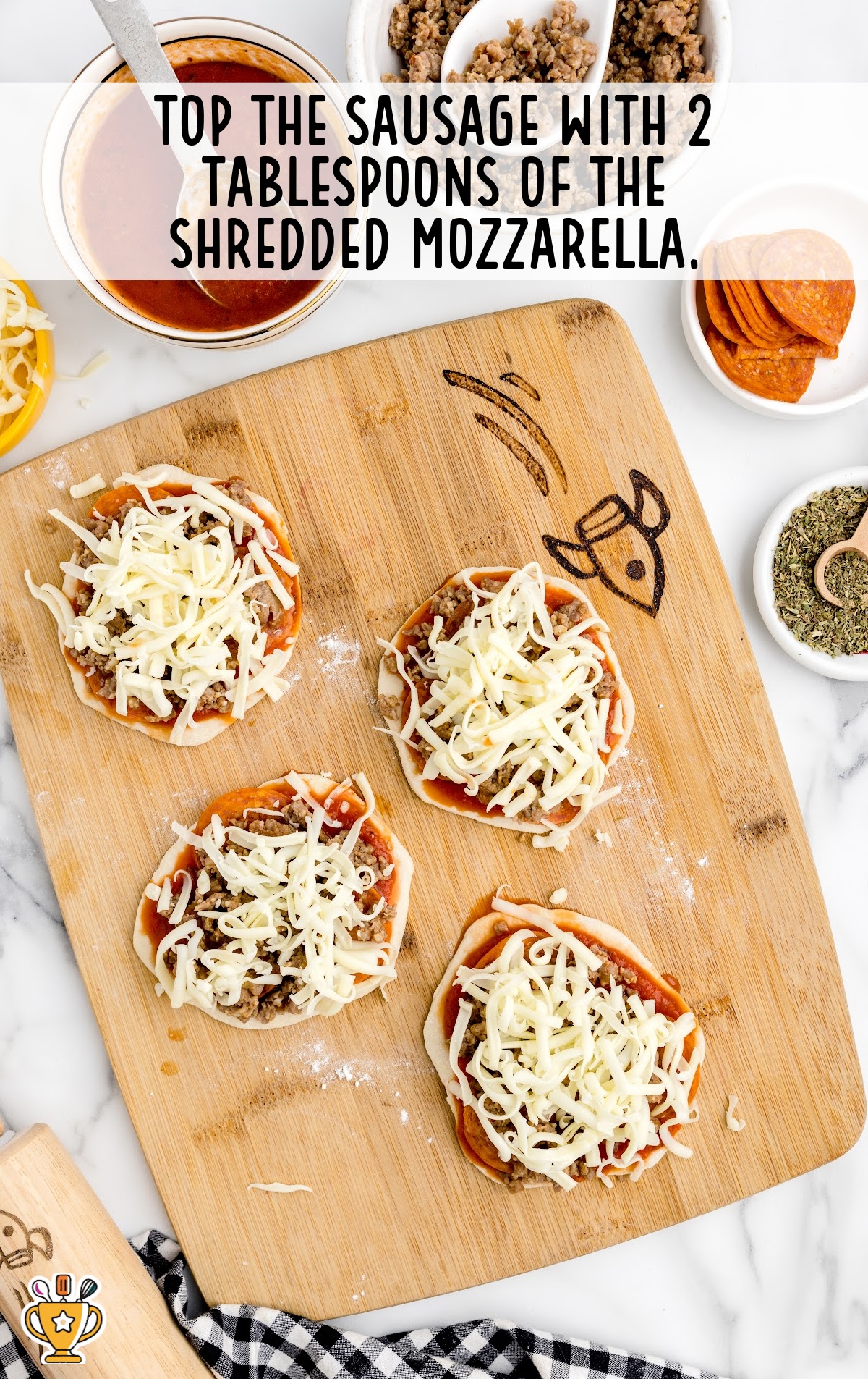 pizzas topped with shredded mozzarella on a wooden board
