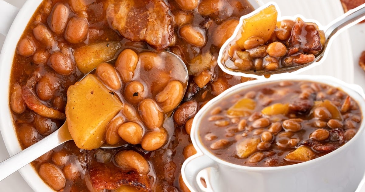 a bowl of Apple Pie Baked Beans with a spoon