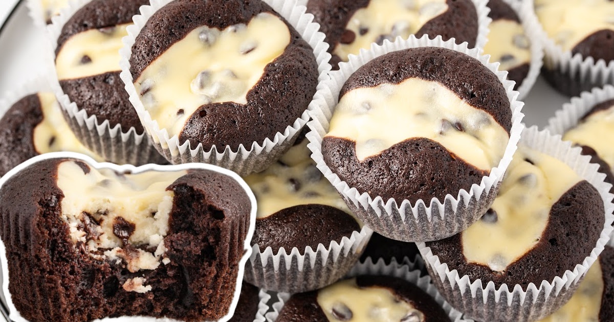 a close up shot of a Black Bottom Cupcake on a plate with a bite taken out of it