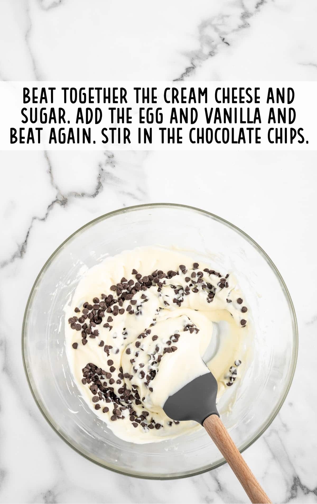 cream cheese and sugar whisked and egg and vanilla added, as well as chocolate chips