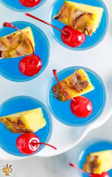 An overhead view of Blue Hawaiian jello shots.