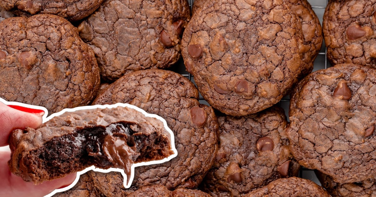 close up shot of Brownie Mix Cookies stacked on top of each other with one split in half