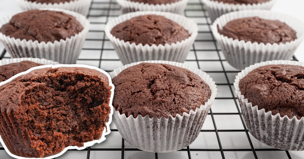 a close upshot of Brownie Muffins stacked on top of each other on a plate
