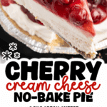 slice of cherry cream cheese no-bake pie being lifted from a graham cracker crust, showing thick creamy layers topped with glossy cherry pie filling and whole cherries.