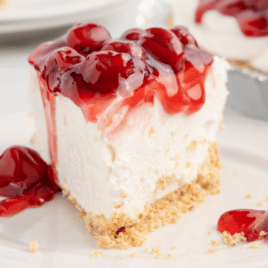 piece of cherry cream cheese pie on a white plate