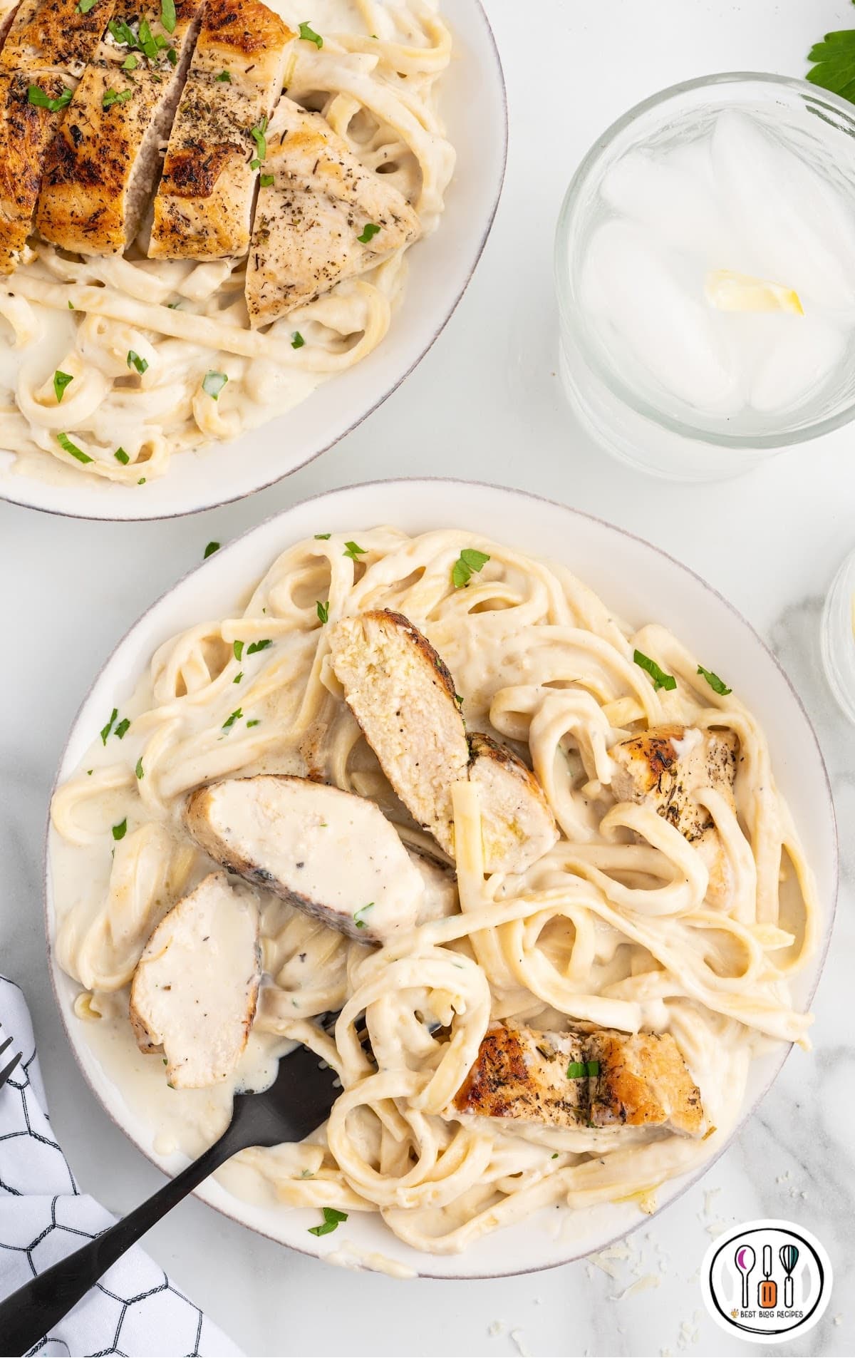 chicken sliced and placed on top of the pasta