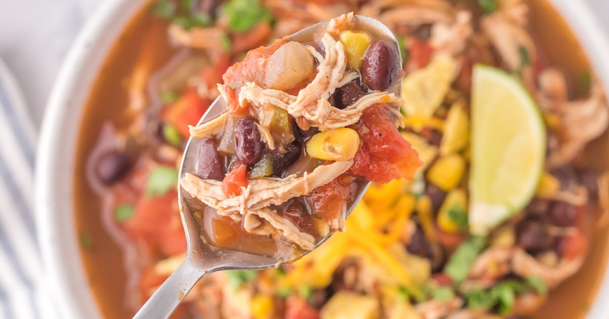 a close up shot of Chicken Taco Soup in a bowl