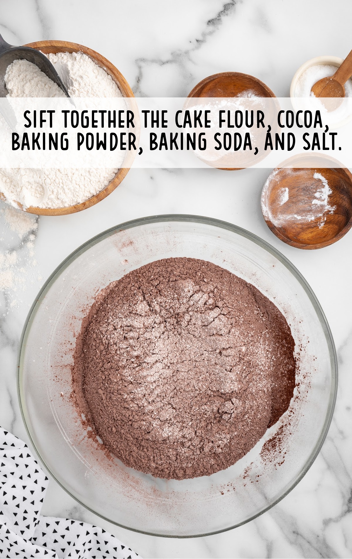 cake flour, unsweetened cocoa powder, baking powder, baking soda, and salt combined in a bowl
