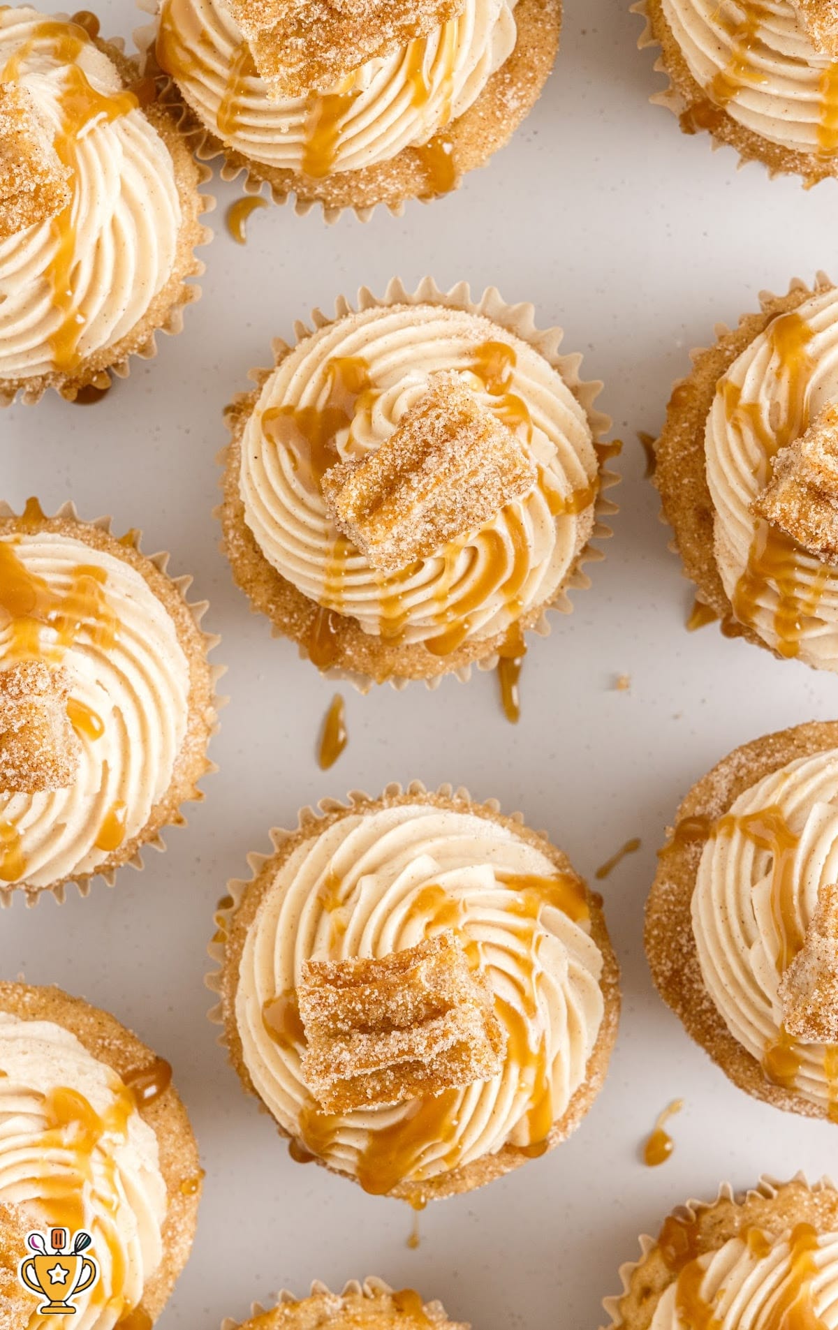caramel sauce drizzled and top with a pieces of churro