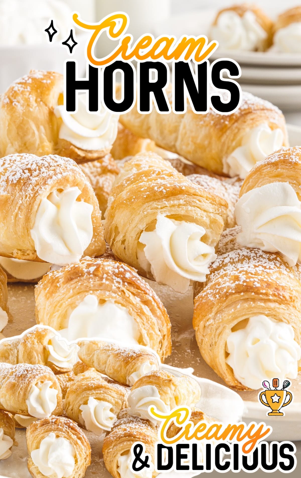 a close up shot of Cream Horns on a plate