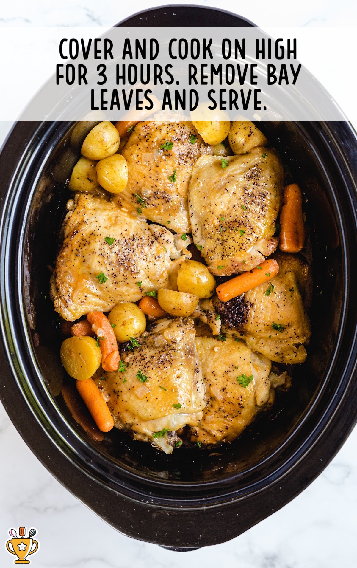 Crockpot Chicken Recipe process shot of chicken, potatoes, and carrots in a crockpot