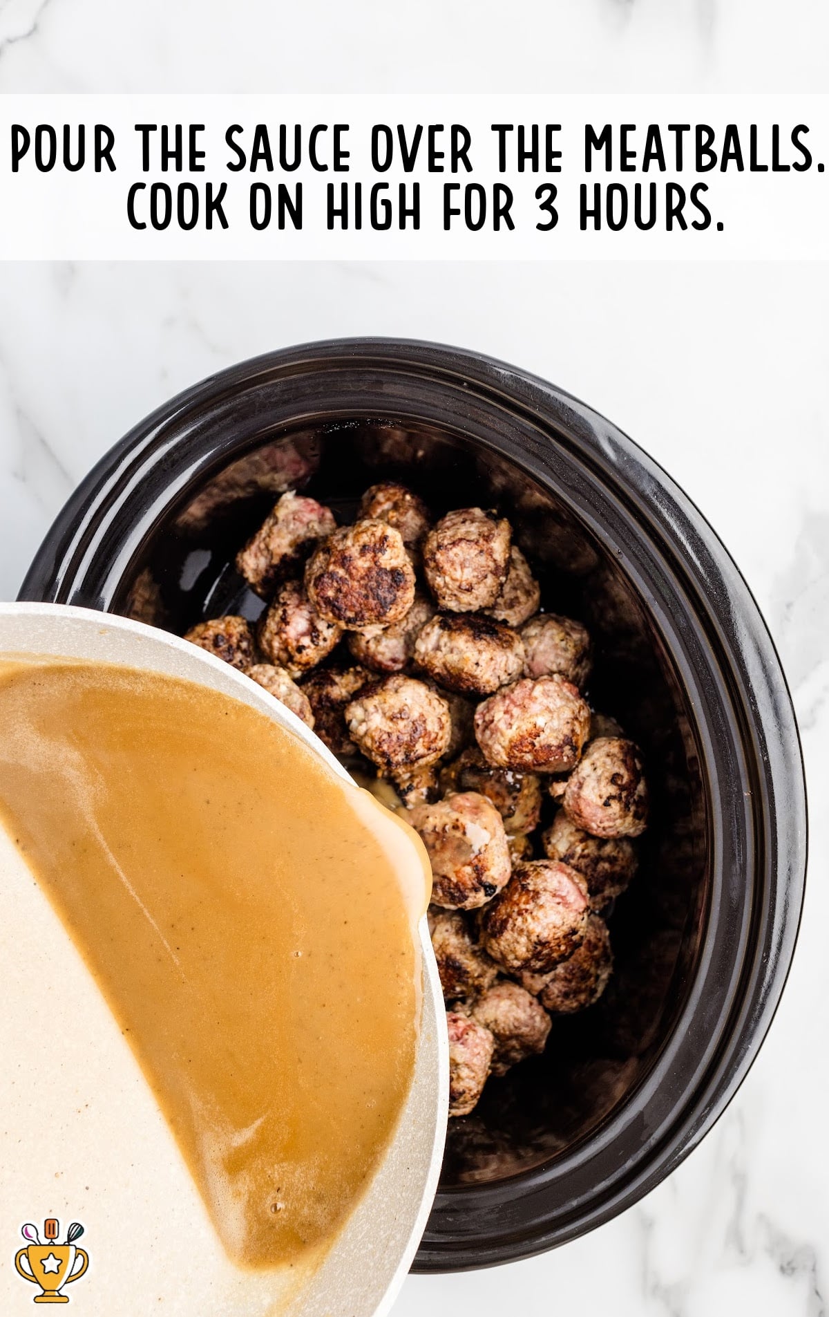 Pouring the sauce over the meatballs into the crockpot.