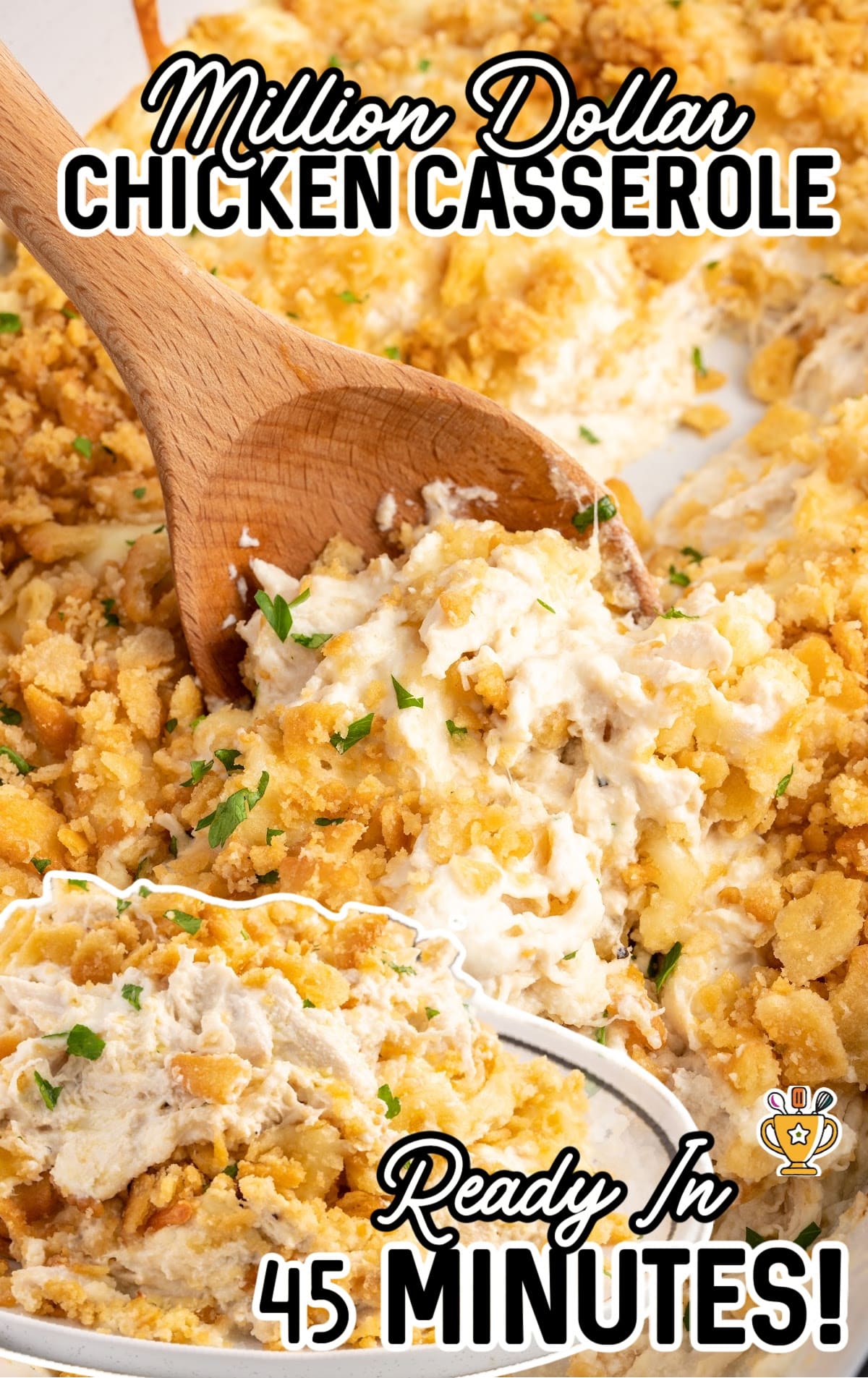 a close up shot of Million Dollar Chicken Casserole with a wooden spoon grabbing a piece