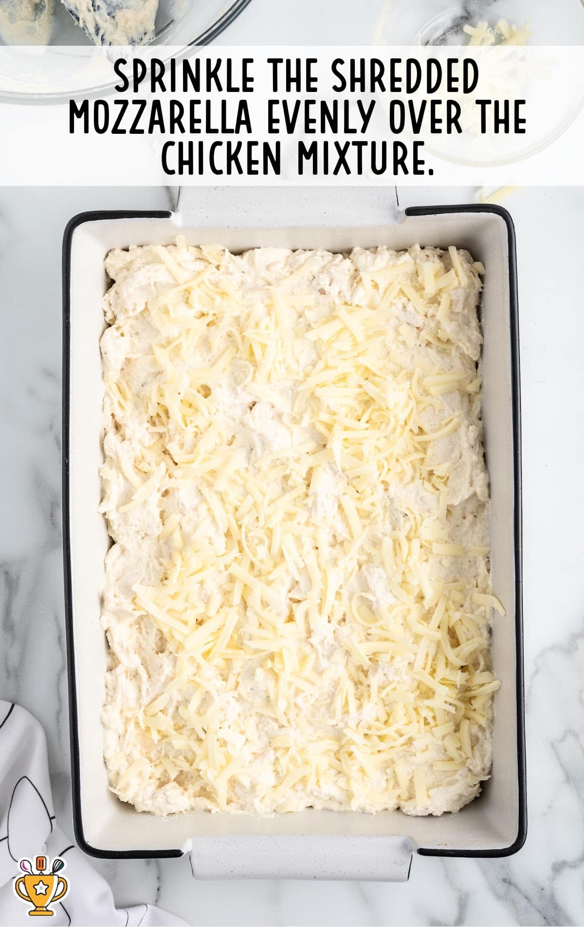 shredded mozzarella sprinkled over the chicken mixture