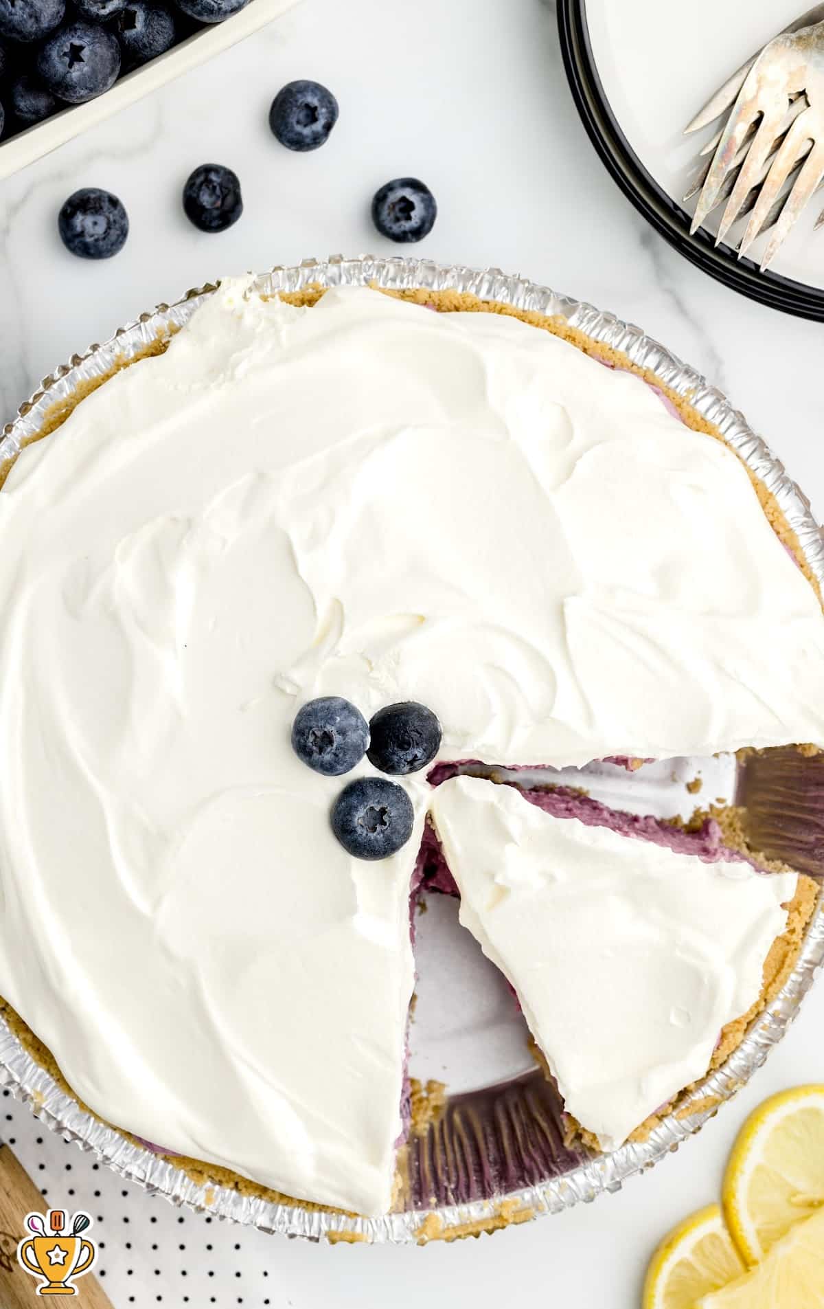 overhead shot of a No Bake Blueberry Pie with slices taken out