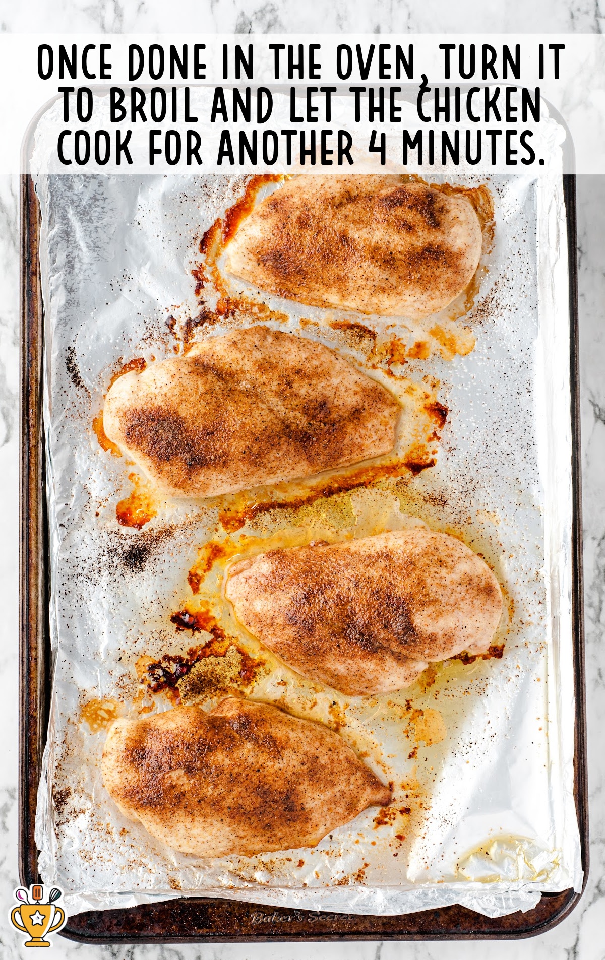 Oven Baked Chicken process shot after chicken is cooked on a baking sheet