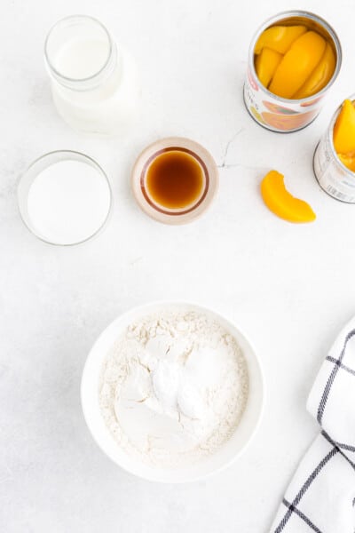 peach cobbler muffin dry ingredients in a bowl on a table