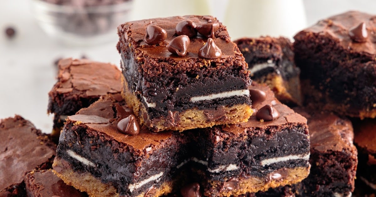 overhead shot of Slutty Brownies on a wooden board