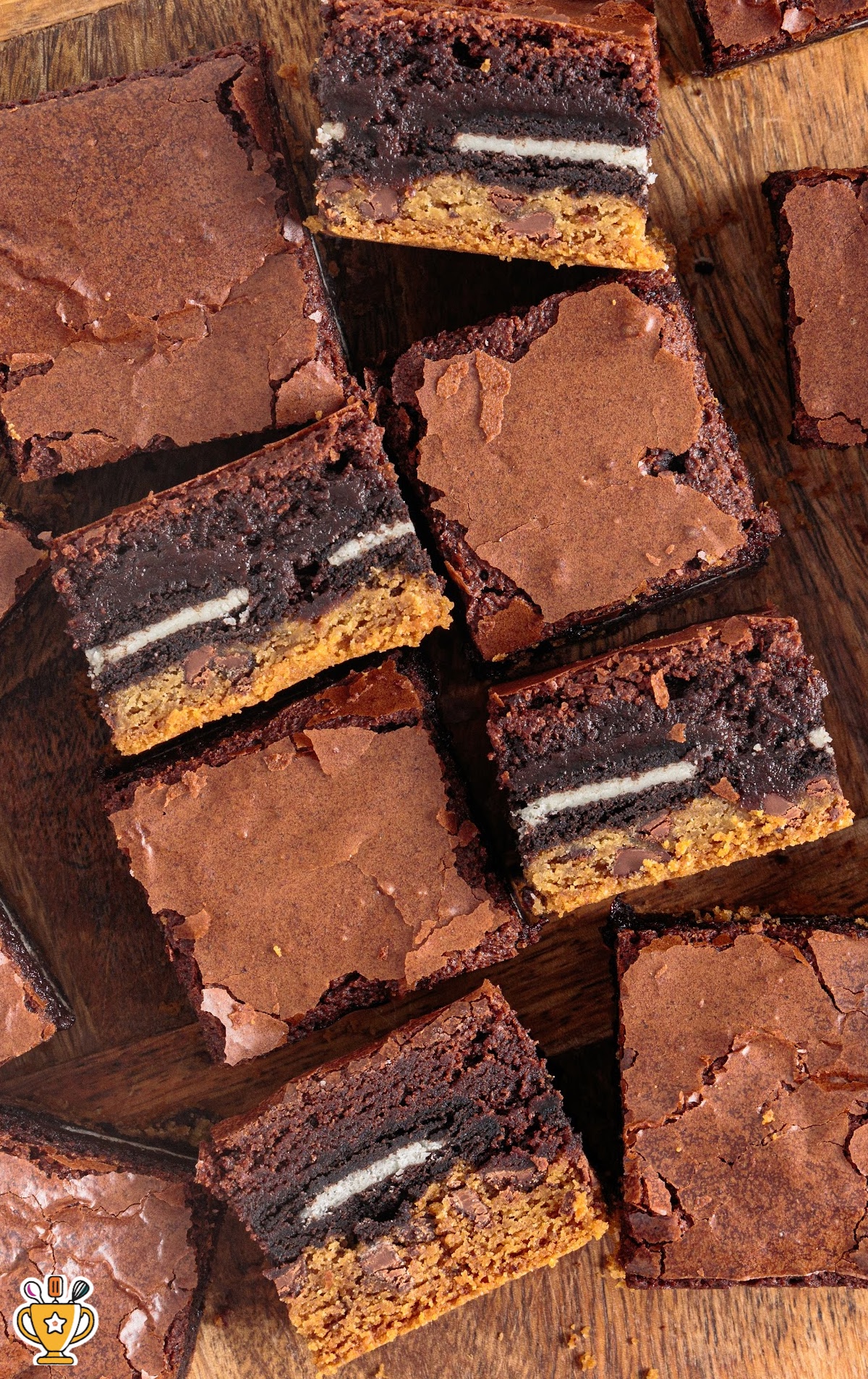 overhead shot of Slutty Brownies on a wooden board