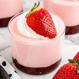 a close up shot of Strawberry Mousse in a cup